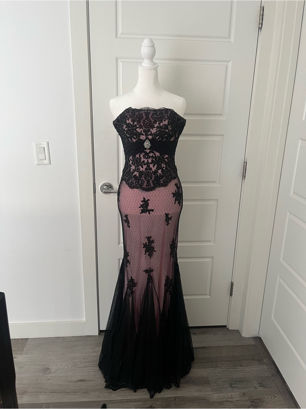 Maggie Sottero Strapless Black Lace Gown with pink Underlay